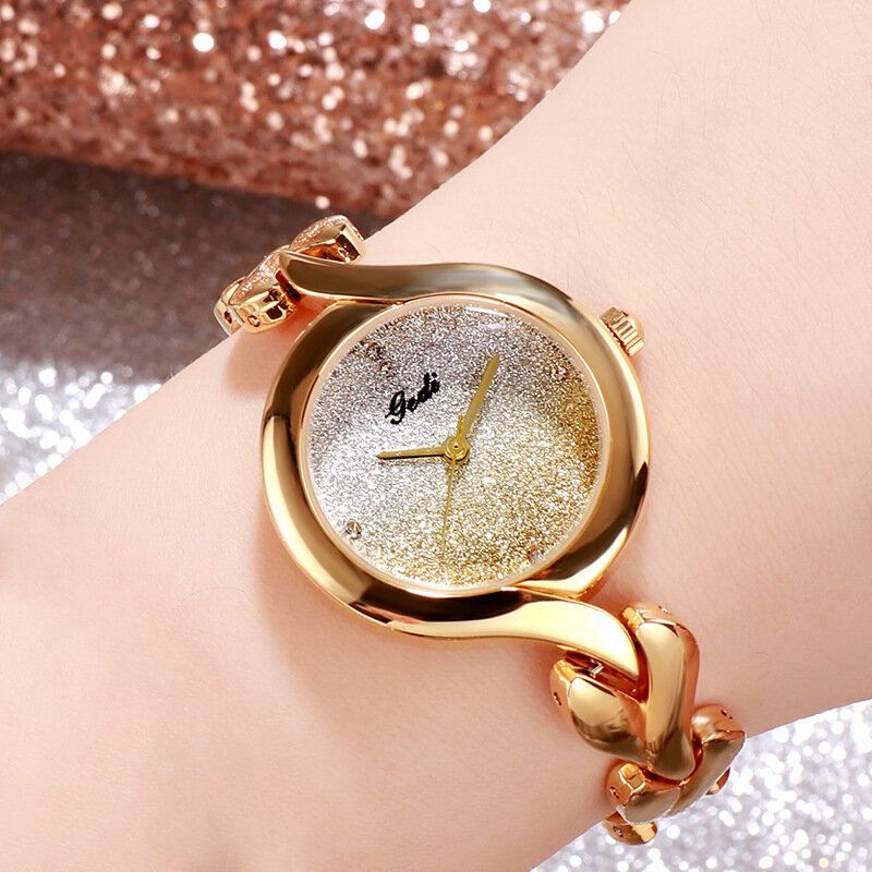 Gedi Fashion Elegant Luxury Crystal Gradient Color Kellotaulu Metalliseos Hihna Naisten Rannekellot Rannekellot Kvartsikello