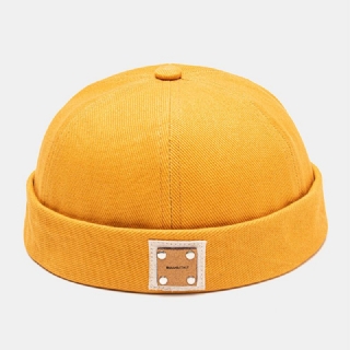 Unisex Polyesteri Puuvilla Yksivärinen Niitti Pu Label Täysin Sopiva Brimless Beanie Landlord Cap Skull Cap