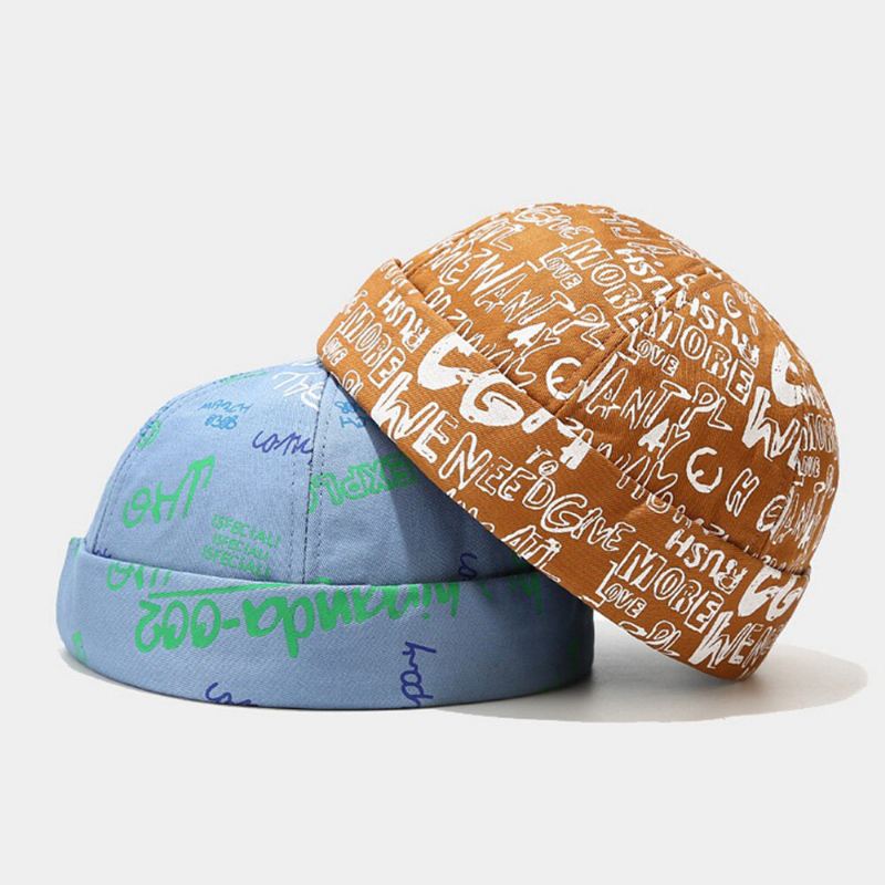 Unisex-puuvillapäällyskirjaimet Graffitiprintti Trendikäs Reunukseton Pipo Landlord Caps Skull Caps